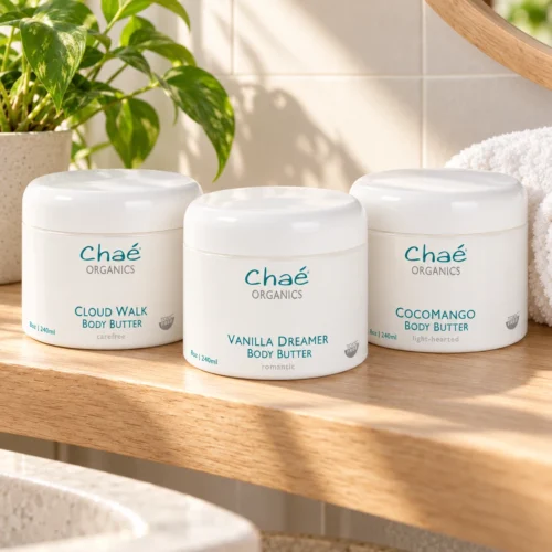 Chaé Body Butter in Cloud Walk, Vanilla Dreamer and CocoMango on a bathroom shelf