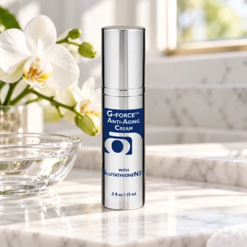 Chaé G-Force Glutathione Cream on a marble vanity with a white orchid