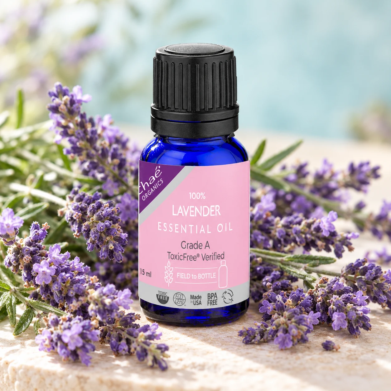 Lavender Essential Oil with a generous bunch of fresh lavender