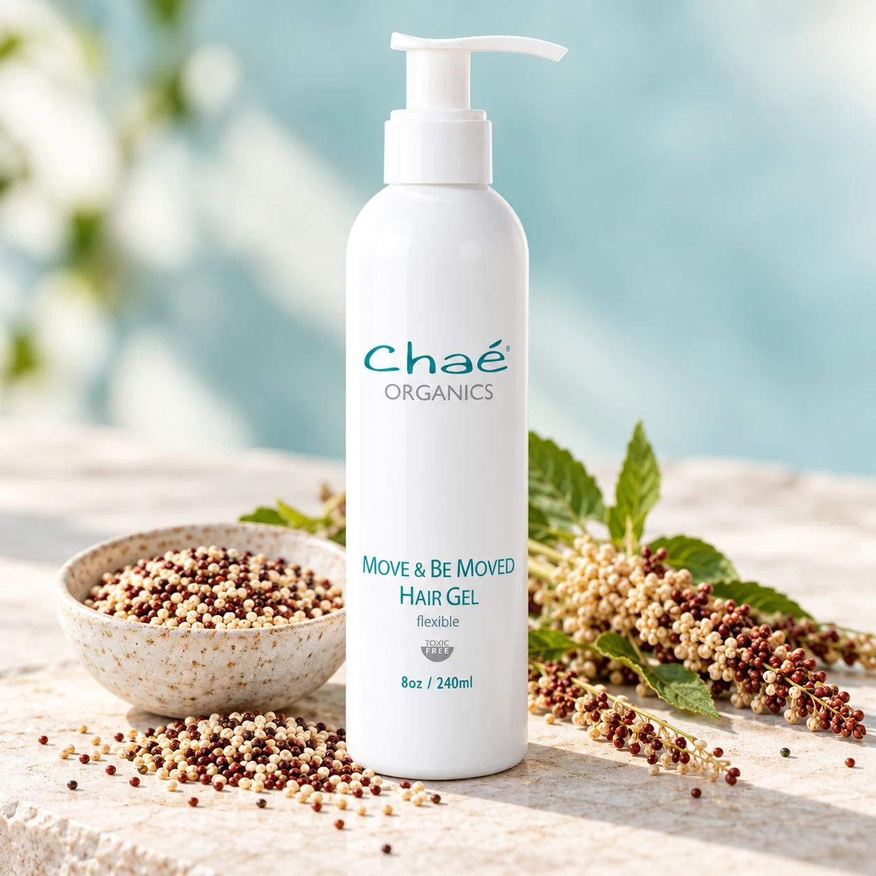 Move and Be Moved Hair Gel with a small bowl of white and red quinoa seeds